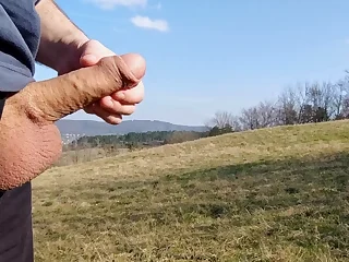 IamHornyBobo jerks off with a thick lollipop and spunk twice in a meadow of enormous dicks