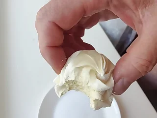 Shy Racoon slurps on the cake and swallows every drop